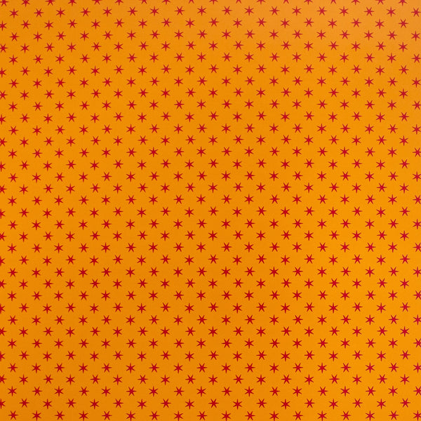 pink stars on coral gift wrap